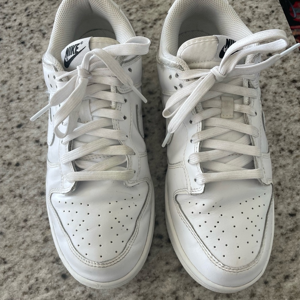 All white Nike low dunks